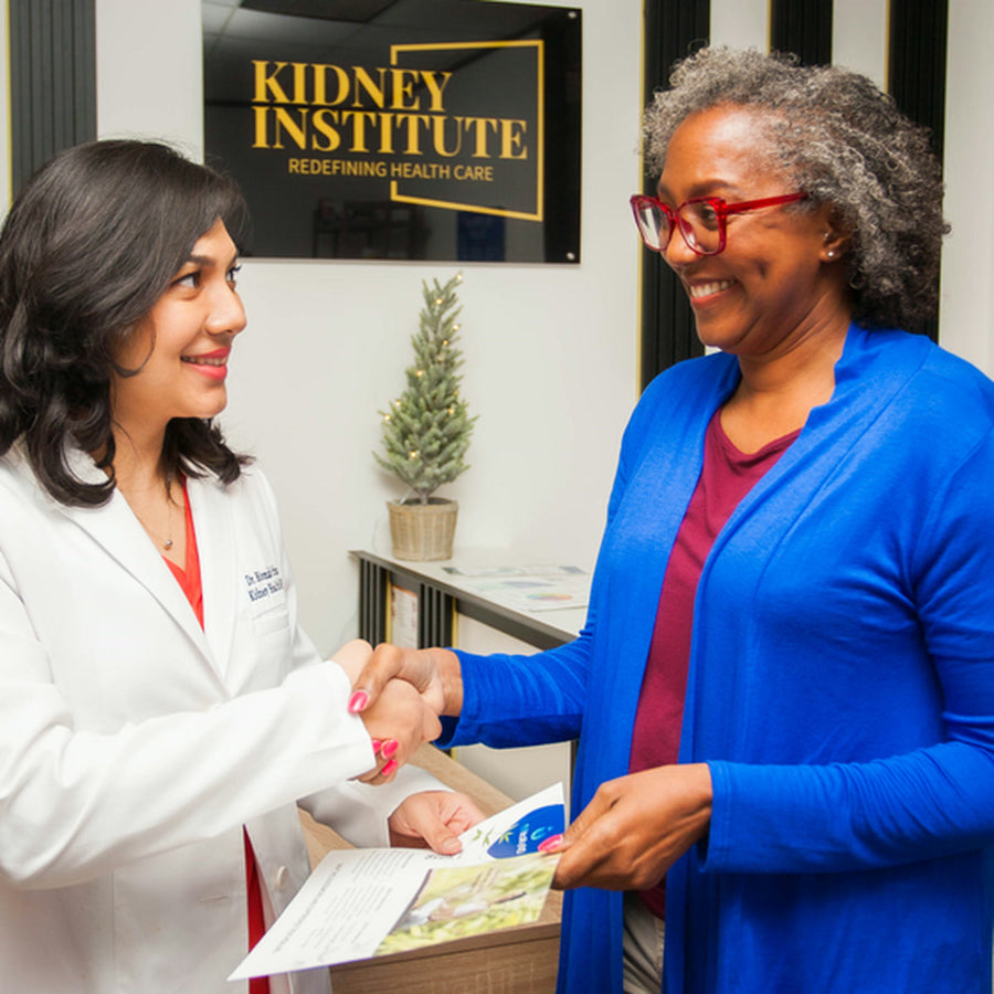 Dr. Bismah Irfan greeting a patient
