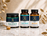 Kidney Balance, Kidney Nourish, and Kidney Boost bottles on a marble counter